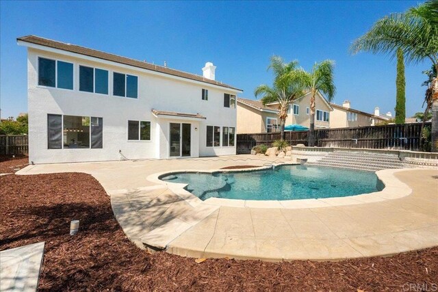 29589 Hazel Glen Rd, Murrieta, CA 92563 - view of swimming pool with a fenced backyard, a patio area, and a jacuzzi