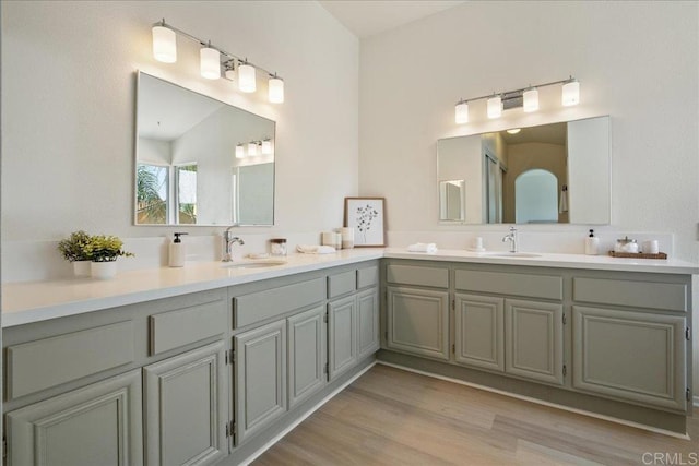 29589 Hazel Glen Rd, Murrieta, CA 92563 - bathroom with double vanity and wood finished floors