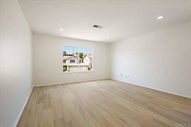 29589 Hazel Glen Rd, Murrieta, CA 92563 - unfurnished room with light wood finished floors and recessed lighting
