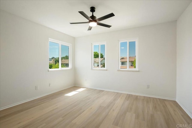 29589 Hazel Glen Rd, Murrieta, CA 92563 - spare room with light wood-style flooring and ceiling fan