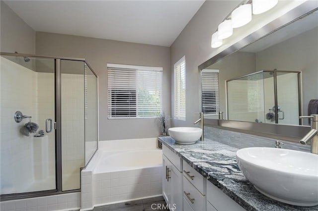 38919 Hickory Hill Ct, Murrieta, CA 92563 - bathroom featuring a bath, a shower stall, and double vanity