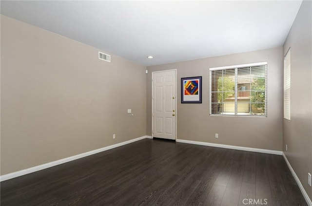 38919 Hickory Hill Ct, Murrieta, CA 92563 - spare room featuring dark wood-style flooring and recessed lighting