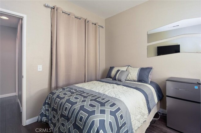 38919 Hickory Hill Ct, Murrieta, CA 92563 - bedroom featuring freestanding refrigerator and wood finished floors