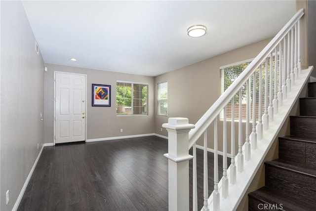 38919 Hickory Hill Ct, Murrieta, CA 92563 - foyer featuring dark wood finished floors and stairs