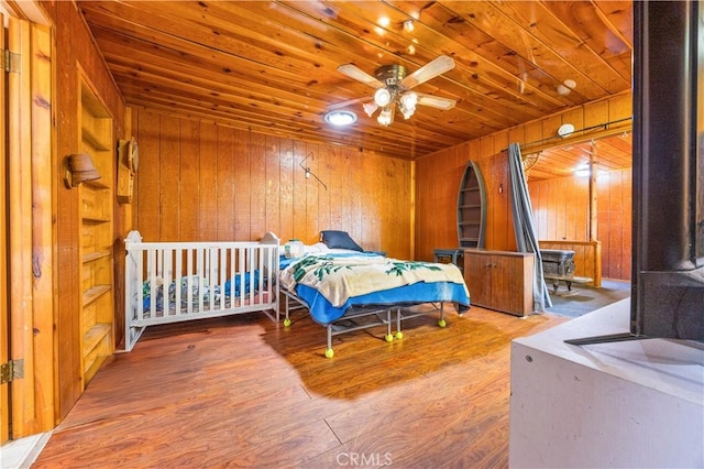 56225 Moonstone Ln, Yucca Valley, CA 92284 - bedroom with wooden ceiling, wooden walls, and wood finished floors