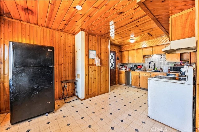 56225 Moonstone Ln, Yucca Valley, CA 92284 - kitchen featuring freestanding refrigerator, light flooring, wood walls, white stove, and wood ceiling