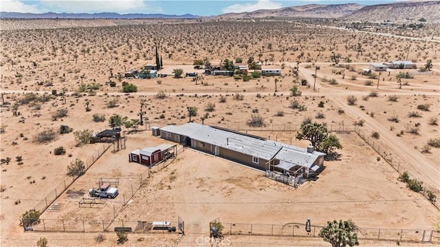 56225 Moonstone Ln, Yucca Valley, CA 92284 - aerial view of sparsely populated area featuring a desert landscape and a mountainous background