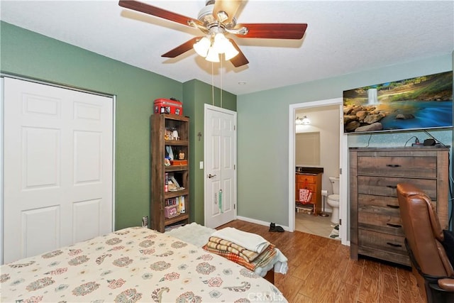 9614 Peach Ave, Hesperia, CA 92345 - bedroom featuring wood finished floors, a ceiling fan, and ensuite bathroom