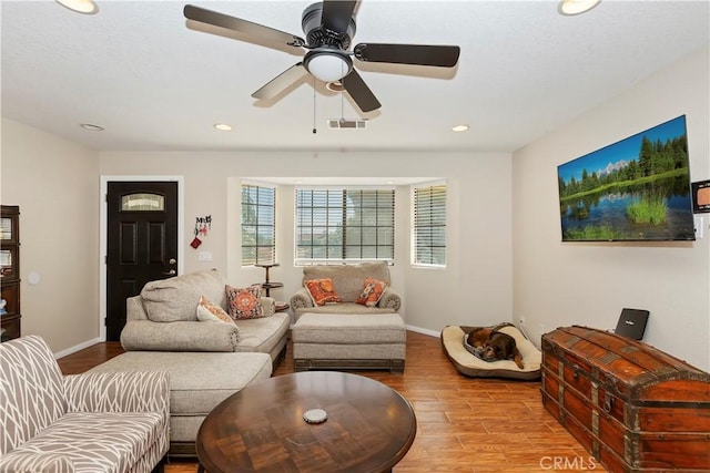 9614 Peach Ave, Hesperia, CA 92345 - living room featuring wood finished floors, recessed lighting, and ceiling fan