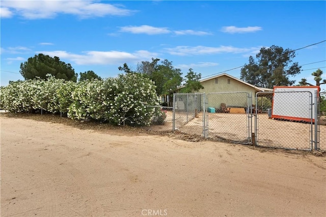 9614 Peach Ave, Hesperia, CA 92345 - view of yard featuring a gate