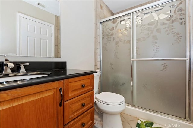 9614 Peach Ave, Hesperia, CA 92345 - full bathroom featuring tile patterned floors, vanity, and a stall shower