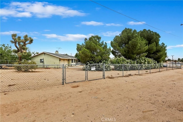 9614 Peach Ave, Hesperia, CA 92345 - view of yard with a gate