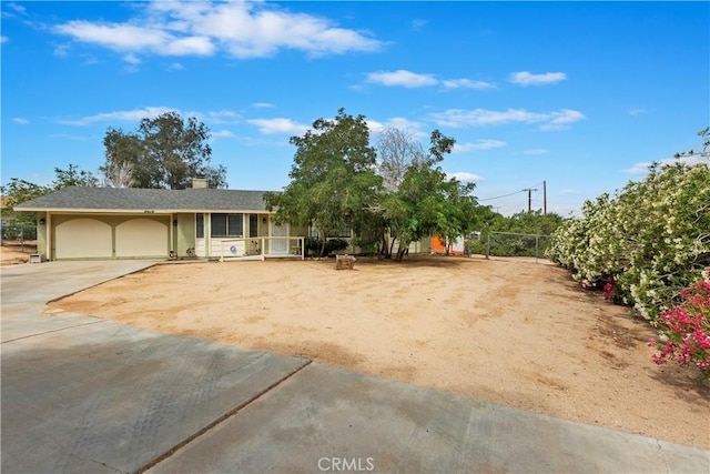 9614 Peach Ave, Hesperia, CA 92345 - view of front of property with concrete driveway and a chimney