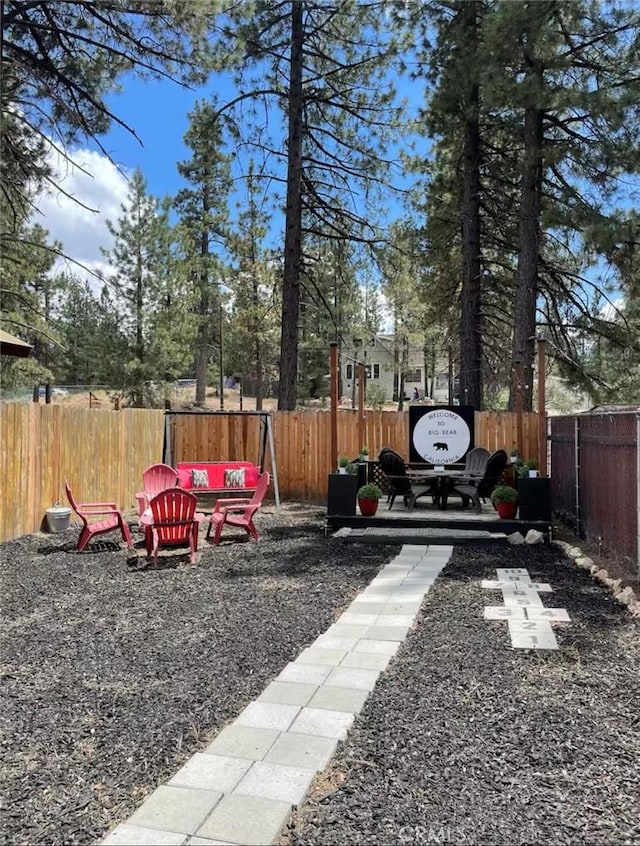 918 W Aeroplane Blvd, Big Bear City, CA 92314 - fenced backyard featuring a patio area