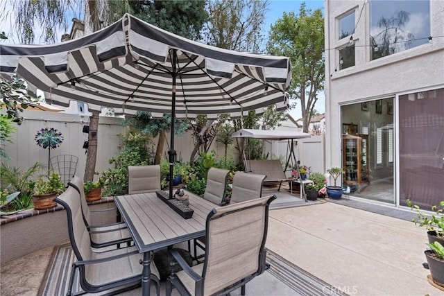 2141 Triador St Unit 103, Corona, CA 92879 - view of patio featuring outdoor dining area