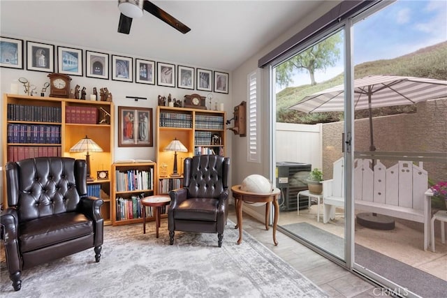 2141 Triador St Unit 103, Corona, CA 92879 - living area featuring a ceiling fan and wood finished floors
