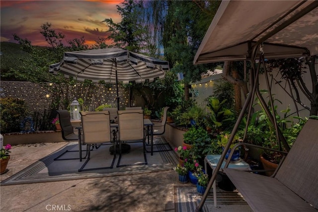 2141 Triador St Unit 103, Corona, CA 92879 - fenced backyard featuring outdoor dining area and a patio