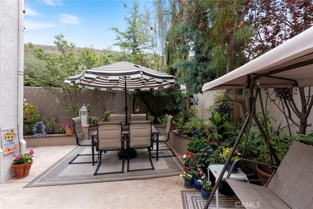 2141 Triador St Unit 103, Corona, CA 92879 - fenced backyard featuring outdoor dining area and a patio area