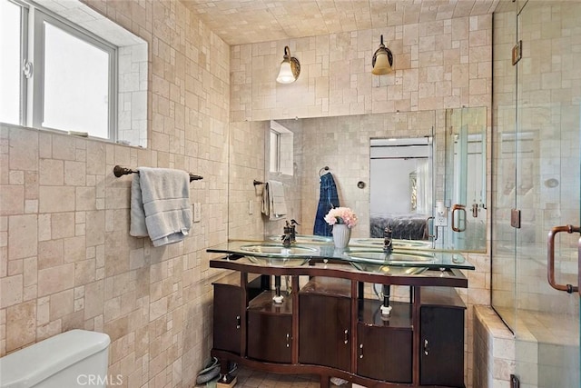 3339 Dorchester Ave, Los Angeles, CA 90032 - full bath with tile walls, a stall shower, and double vanity
