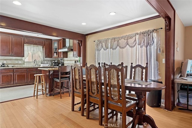 3339 Dorchester Ave, Los Angeles, CA 90032 - dining room with light wood-type flooring, healthy amount of natural light, recessed lighting, and ornamental molding