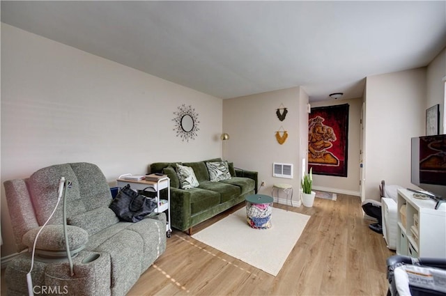 866 Brighton Ave, Grover Beach, CA 93433 - living room featuring light wood-style flooring and baseboards