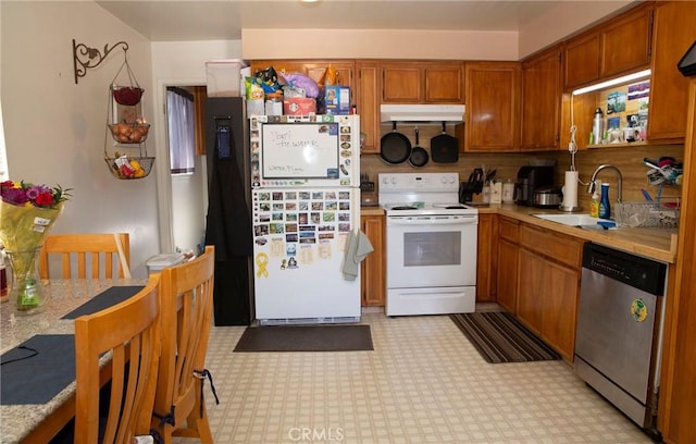 866 Brighton Ave, Grover Beach, CA 93433 - kitchen with white appliances, under cabinet range hood, light countertops, and brown cabinetry