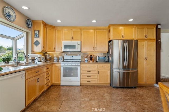 20121 Swansea Ln, Huntington Beach, CA 92646 - kitchen with white appliances, a sink, light brown cabinets, recessed lighting, and decorative backsplash