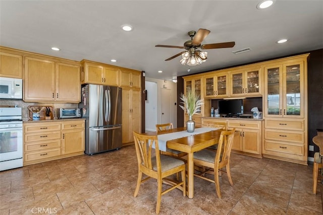 20121 Swansea Ln, Huntington Beach, CA 92646 - dining space with recessed lighting, ceiling fan, and a desk
