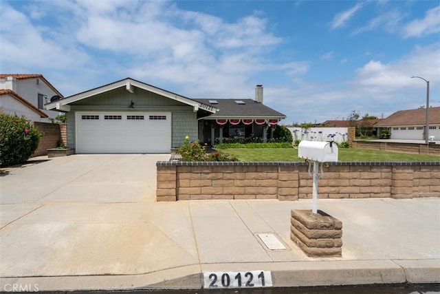 20121 Swansea Ln, Huntington Beach, CA 92646 - ranch-style house featuring an attached garage, driveway, and a chimney