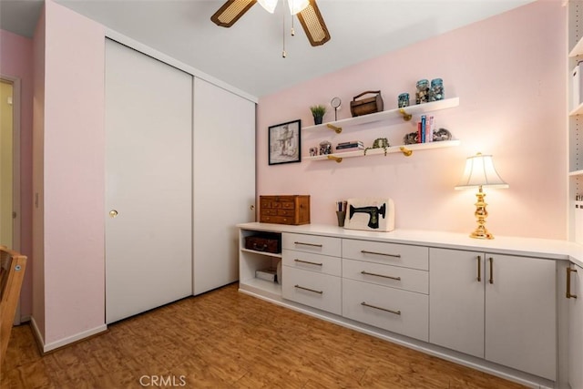 20121 Swansea Ln, Huntington Beach, CA 92646 - office with a ceiling fan and light wood finished floors
