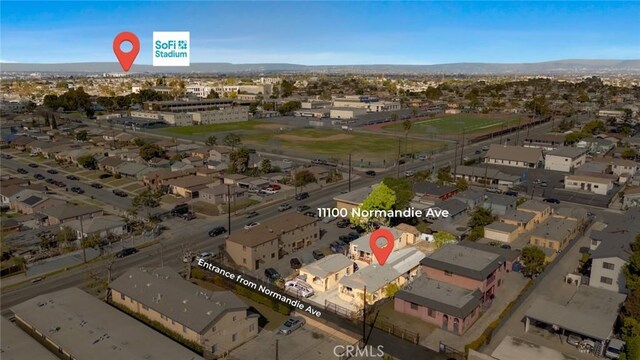 11100 S Normandie Ave, Los Angeles, CA 90044 - aerial overview of property's location featuring a mountainous background