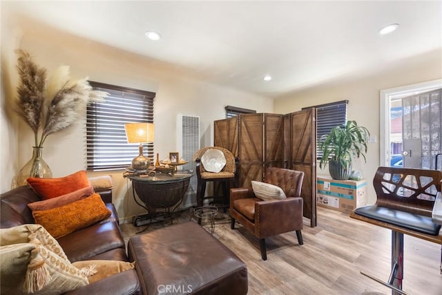 11100 S Normandie Ave, Los Angeles, CA 90044 - living area with wood finished floors and recessed lighting