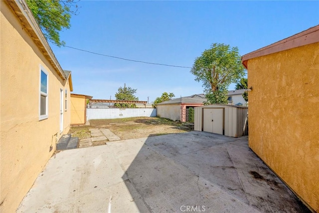 11100 S Normandie Ave, Los Angeles, CA 90044 - fenced backyard with a patio area