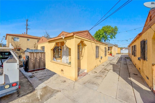 11100 S Normandie Ave, Los Angeles, CA 90044 - view of property exterior with stucco siding