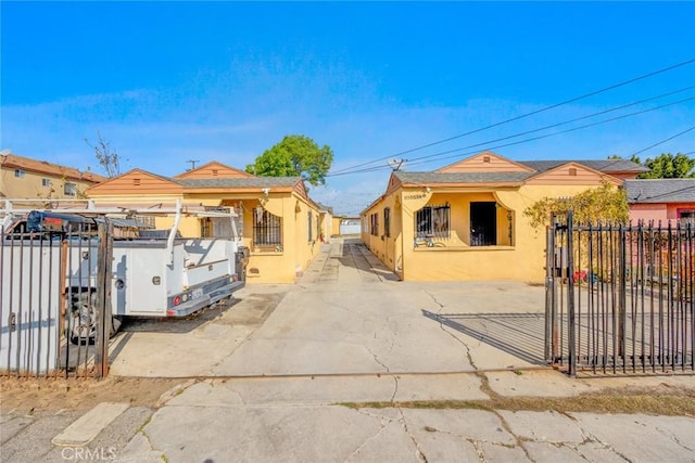 11100 S Normandie Ave, Los Angeles, CA 90044 - bungalow-style house with stucco siding