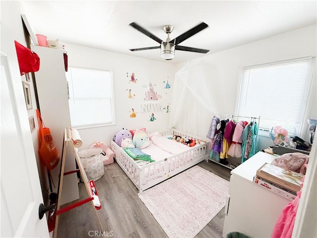 858 Bussey St, San Bernardino, CA 92405 - bedroom with wood finished floors and a ceiling fan