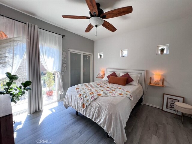 26959 Hillsborough Pkwy, Unit Valencia, CA 91354 - bedroom with access to outside, wood finished floors, ceiling fan, and baseboards