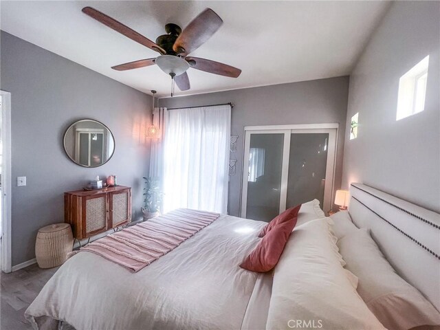 26959 Hillsborough Pkwy, Unit Valencia, CA 91354 - bedroom with a closet, wood finished floors, ceiling fan, and baseboards