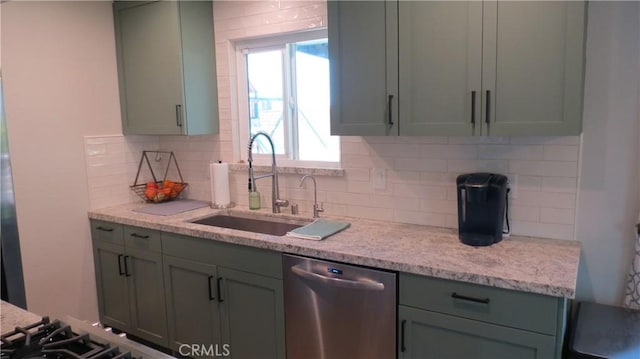 6214 Granby Ave, Rancho Cucamonga, CA 91737 - kitchen with stainless steel dishwasher, a sink, backsplash, light stone countertops, and gray cabinetry