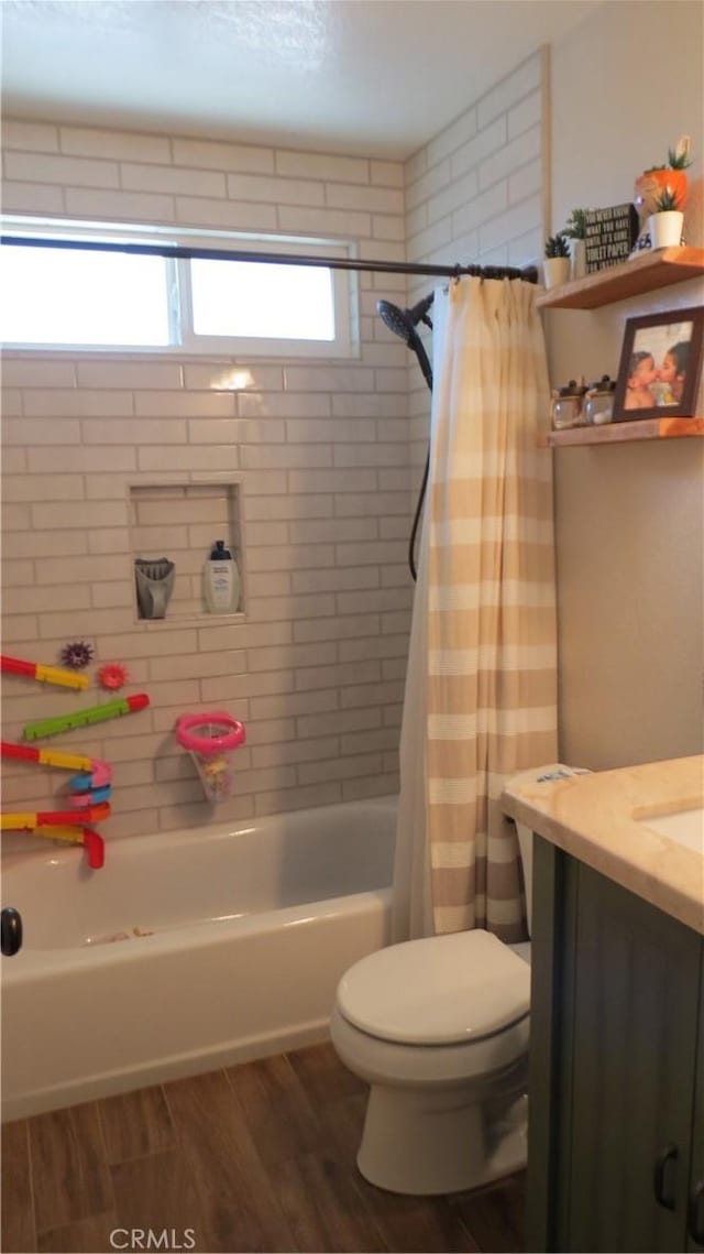 6214 Granby Ave, Rancho Cucamonga, CA 91737 - bathroom with wood finished floors, toilet, shower / bath combo with shower curtain, and vanity