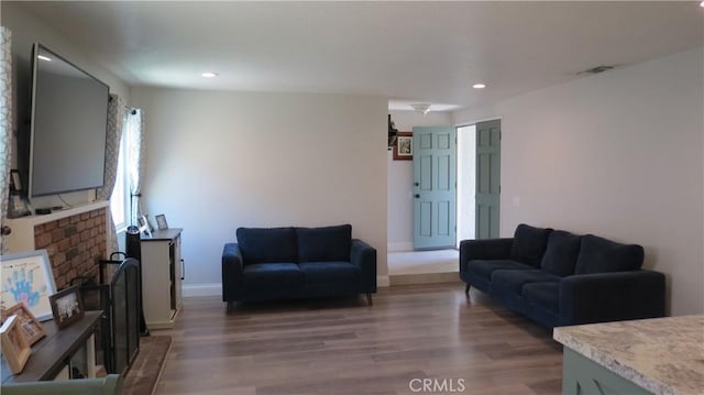 6214 Granby Ave, Rancho Cucamonga, CA 91737 - living area featuring wood finished floors, recessed lighting, and baseboards