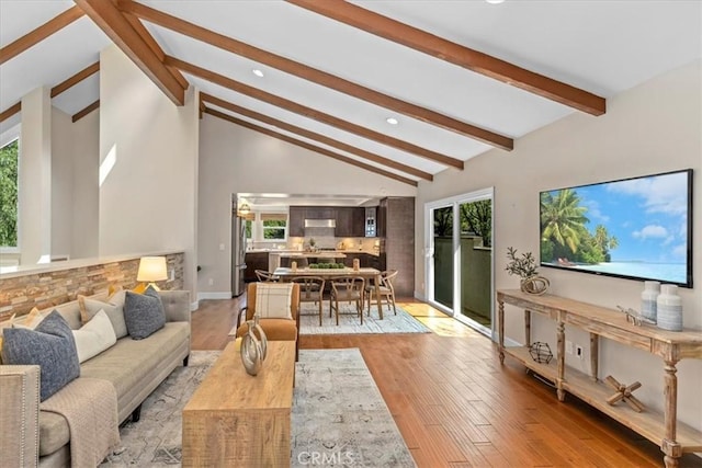 2363 Via Cielo, Hacienda Heights, CA 91745 - living room featuring beamed ceiling, light wood-style floors, recessed lighting, high vaulted ceiling, and baseboards