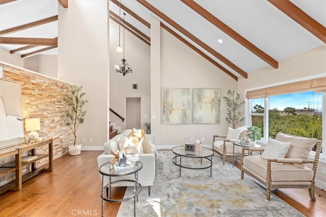2363 Via Cielo, Hacienda Heights, CA 91745 - living room with high vaulted ceiling, stairs, beamed ceiling, wood finished floors, and baseboards