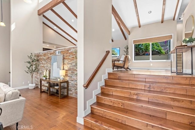 2363 Via Cielo, Hacienda Heights, CA 91745 - staircase featuring beamed ceiling, wood finished floors, high vaulted ceiling, recessed lighting, and baseboards