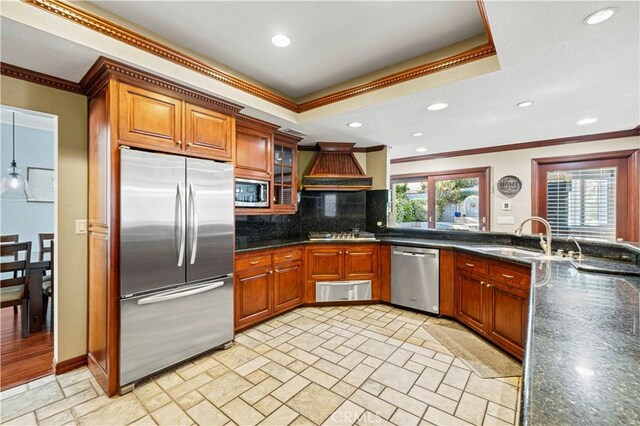 28642 Apricot Pl, Saugus, CA 91390 - kitchen featuring built in appliances, a sink, ornamental molding, tasteful backsplash, and a warming drawer