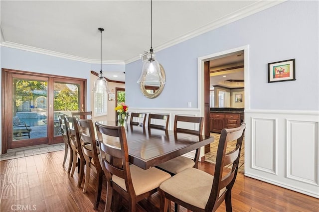 28642 Apricot Pl, Saugus, CA 91390 - dining space with ornamental molding, wood finished floors, and wainscoting