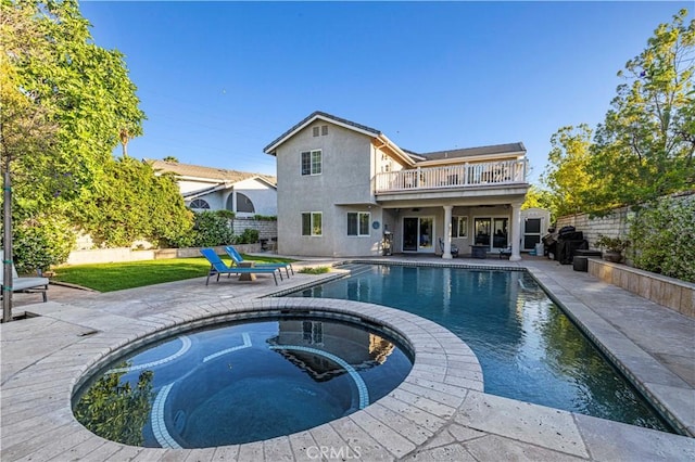 28642 Apricot Pl, Saugus, CA 91390 - view of swimming pool with a patio, a fenced backyard, and a pool with connected hot tub