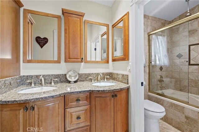 28642 Apricot Pl, Saugus, CA 91390 - full bath featuring tiled shower / bath combo, toilet, and double vanity