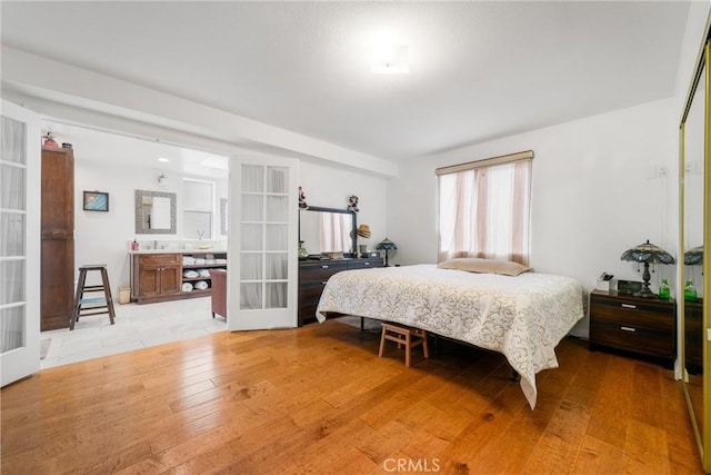 3133 W 187th Pl, Torrance, CA 90504 - bedroom with french doors and light wood-style floors