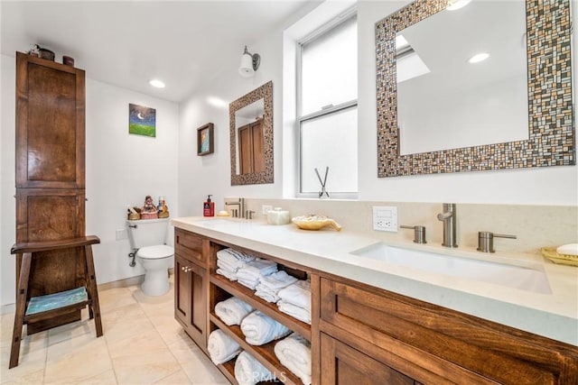 3133 W 187th Pl, Torrance, CA 90504 - bathroom featuring toilet, double vanity, recessed lighting, tile patterned floors, and baseboards